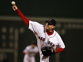 Curt Schilling of the Boston Red pitches against the Cleveland Indians in Boston on Saturday, Oct. 13, 2007.