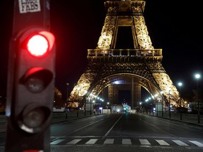 A view shows the deserted Iena Bridge near the Eiffel Tower during a nationwide curfew  in Paris, France January 25, 2021.