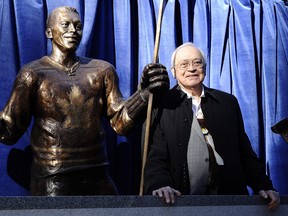 George Armstrong beside his statue on Legends Row ahead of the Legends Classic at the then-Air Canada Centre in Toronto on Nov. 8, 2015.