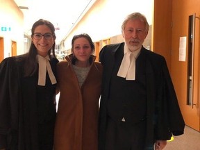 Nicky Scardini (centre) and her legal team, lawyers Peter Zaduk and Monica Rodrigues