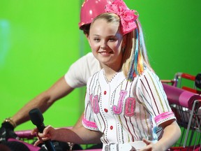 JoJo Siwa speaks onstage during the Nickelodeon Kids' Choice Sports 2018 at Barker Hangar on July 19, 2018 in Santa Monica, Calif.