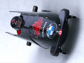 Chris Spring and Neville Wright of Canada compete during the first run of the two-man bobsled earlier this year.