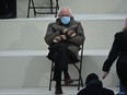 Sen. Bernie Sanders sits in the bleachers on Capitol Hill before Joe Biden is sworn in as the 46th U.S. president on Jan. 20, 2021, at the U.S. Capitol in Washington, D.C.