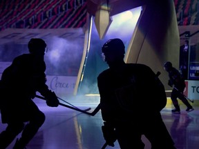 Brayden McNabb, left, and Alex Pietrangelo of the Vegas Golden Knights are silhouetted as they take the ice for a game against the St. Louis Blues at T-Mobile Arena on Jan. 26, 2021 in Las Vegas, Nevada.