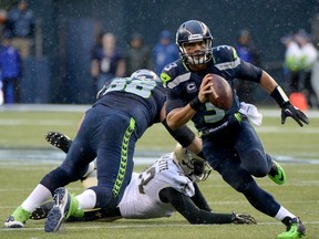 Russell Wilson and the Seattle Seahawks should win today in a defensive struggle over a banged-up Jared Goff and the Rams.