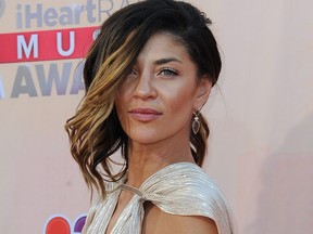 Actress Jessica Szohr arrives on the red carpet for the iHeartRadio Music Awards held at the Shrine Auditorium in Los Angeles, Calif. on March 29,2015.
