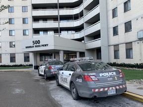 Toronto Police at the scene at 500 Murray Ross Pkwy. on Friday, Jan. 22, 2021, the day after a woman was found dead in one of the units.