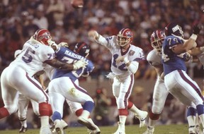 Buffalo Bills quarterback Jim Kelly throws the ball during Super Bowl XXV at Tampa Stadium in 1991. Kelly and the Bills played in four Super Bowls and lost each time. POSTMEDIA NETWORK FILES
