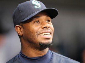 Ken Griffey Jr. of the Seattle Mariners smiles in the dugout prior to a game against the Texas Rangers at Safeco Field on April 30, 2010 in Seattle.
