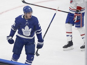 Jimmy Vesey celebrates scoring his first goal as a Maple Leaf during the third period in Toronto on Wednesday January 13, 2021.