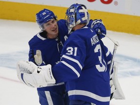 Toronto Maple Leafs Mitch Marner RW (16) congratulates Frederik Andersen G (31) after the 3-1 win against the Winnipeg Jets in Toronto on Monday, January 18, 2021.