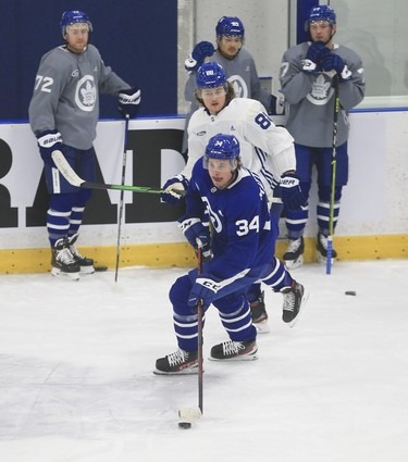 Toronto Maple Leafs Auston Matthews C (34) cuts through centre pursued by  Nylander RW (88) at practice in Toronto on Tuesday January 12, 2021. Jack Boland/Toronto Sun/Postmedia Network