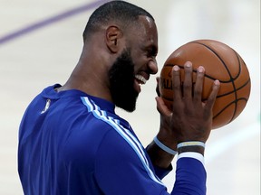 LeBron James of the Los Angeles Lakers laughs prior to a game against the San Antonio Spurs at Staples Center on Jan. 7, 2021 in Los Angeles, Calif.