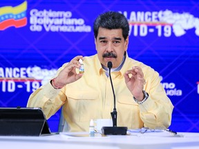Venezuela's President Nicolas Maduro speaks during an announcement promoting Carvativir, in Caracas, January 24, 2021.