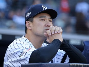 New York Yankees pitcher Masahiro Tanaka looks on before Game 3 of the 2019 ALCS against the Houston Astros at Yankee Stadium.