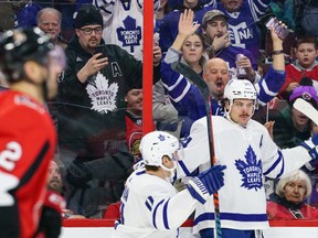 Maple Leafs' Auston Matthews celebrates a goal with teammate Zach Hyman during a game against the Ottawa Senators at Canadian Tire Centre in Ottawa in February.