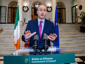 Irish Prime Minister Micheal Martin makes a televised address the nation at Government Buildings in Dublin on December 22, 2020.