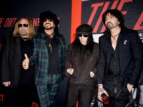 Vince Neil, Nikki Sixx, Mick Mars and Tommy Lee of Motley Crue arrive at the premiere of Netflix's "The Dirt" at ArcLight Hollywood on March 18, 2019 in Hollywood.