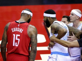 Markieff Morris (88) of the Lakers reacts towards DeMarcus Cousins (15) of the Rockets before being ejected during the first quarter of a game at Toyota Center, in Houston, Sunday, Jan. 10, 2021.