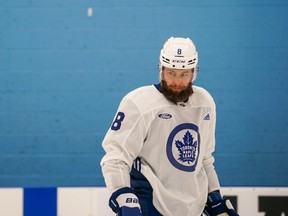 Veteran defenceman Jake Muzzin skates at Maple Leafs training camp on Tuesday.