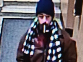 An image released by Toronto Police of a man suspected in the attempt to enter a woman's apartment in the Jameson Ave. and Leopold St. area on Wednesday, Jan. 20, 2021.