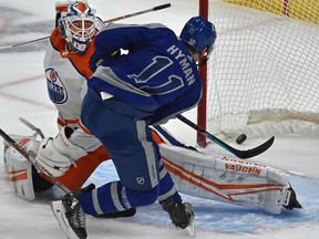 Toronto Maple Leafs Zach Hyman (11) scores on Edmonton Oilers goalie Mikko Koskinen (19) during NHL action at Rogers Place in Edmonton on Saturday night.