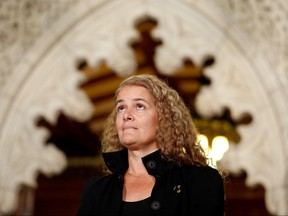 In this July 13, 2017 file photo, former astronaut Julie Payette takes part in a news conference announcing her appointment as Canada's next Governor General, in the Senate foyer on Parliament Hill in Ottawa.