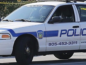 A man allegedly claimed to have explosives as he robbed a financial institution in Brampton, according to Peel Regional Police.