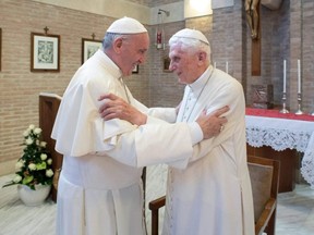 Both Pope Francis (left) and his predecessor, former pope Benedict XVI (right), have received the first dose of the COVID-19 vaccine, the Vatican said on Thursday, Jan. 14, 2021.