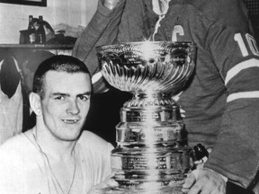Maple Leafs' Dave Keon, left, and George Armstrong with the Stanley Cup in 1963.