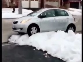 A man gets stuck in a snowbank in Mississauga after allegedly trying to steal a package.