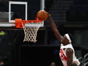 Toronto Raptors forward Pascal Siakam dunks against the Boston Celtics.