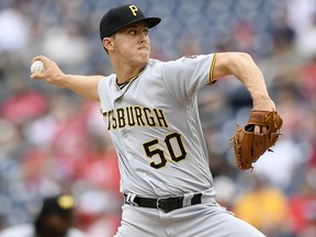 Pittsburgh Pirates pitcher Jameson Taillon delivers a pitch against the Washington Nationals, Sunday, April 14, 2019, in Washington.