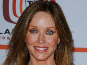 This file photo shows actress Tanya Roberts arrives for the 4th annual TV Land awards held at Barker hangar in Santa Monica, Calif., on March 19, 2006.