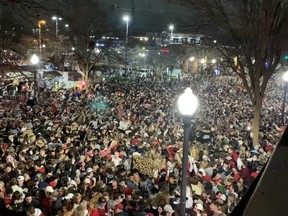 Alabama Crimson Tide fans flood the streets of Tuscaloosa after the team's college football championship win against Ohio State Monday, Jan. 11, 2021..