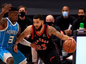 Fred VanVleet (right) drives on Terry Rozier during the Raptors' win over the Charlotte Hornets on Saturday night. It was Toronto's second win in a row.