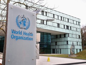 A logo is pictured outside a building of the World Health Organization in Geneva, Switzerland.