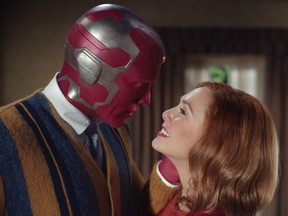 Paul Bettany as Vision and Elizabeth Olsen as Wanda Maximoff in Marvel Studios' WandaVision.