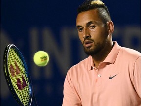 In this file photo taken on February 25, 2020 Australia's Nick Kyrgios hits the ball during his Mexico ATP Open 500 men's singles tennis match against France's Ugo Humbert in Acapulco, Guerrero State, Mexico.
