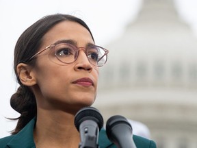In this file photo taken on February 7, 2019 US Representative Alexandria Ocasio-Cortez, Democrat of New York, speaks during a press conference to announce Green New Deal legislation to promote clean energy programs outside the US Capitol in Washington, DC.