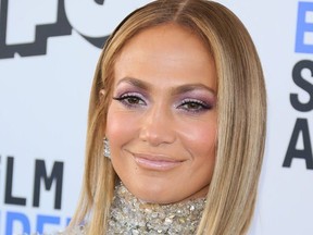 In this file photo taken Feb. 8, 2020, Jennifer Lopez arrives for the 35th Film Independent Spirit Awards in Santa Monica, Calif.