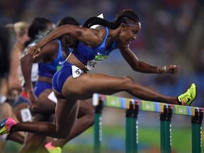 In this file photo taken on August 18, 2016 USA's Brianna Rollins competes in the Women's 100m Hurdles final during the athletics event at the Rio 2016 Olympic Games at the Olympic Stadium.
