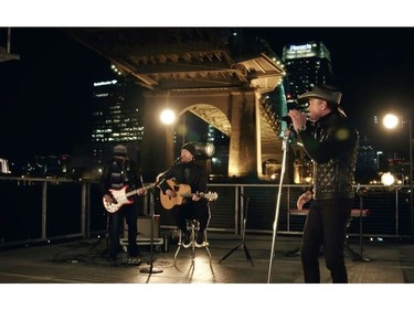 This screen grab courtesy of bideninaugural.org shows singers Tyler Hubbard and Tim McGraw perform during the "Celebrating America" inaugural program for U.S. President Joe Biden and U.S. Vice-President Kamala Harris on Jan. 20, 2021.