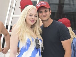 Tiffany Trump and her boyfriend Michael Poulos attend the Trump fundraising flotilla in Montauk, NY.