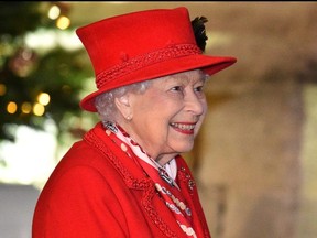 Britain's Queen Elizabeth smiles at Windsor Castle, in Windsor, Britain December 8, 2020.