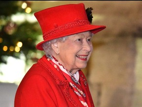 Queen Elizabeth smiles at Windsor Castle, in Windsor, Britain on Dec. 8, 2020.  The monarch has not had a lot to smile about recently.