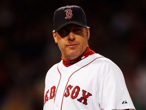 Curt Schilling, seen here pitching for the Boston Red Sox, did not receive enough votes to earn a place in Cooperstown, home of the Baseball Hall Of Fame.