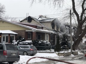 Fire crews at the scene of a fatal blaze at 95 Gainsborough Rd. in Toronto on Friday, Jan. 29, 2021.