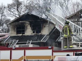 Fire crews at the sceneo of a fatal blaze at 95 Gainsborough Rd. in Toronto on Friday, Jan. 29, 2021.