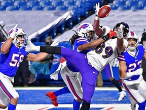 Buffalo Bills middle linebacker Tremaine Edmunds (49) breaks up a pass intended for Baltimore Ravens tight end Mark Andrews (89) during the second half of an AFC Divisional Round playoff game at Bills Stadium. The Buffalo Bills won 17-3.